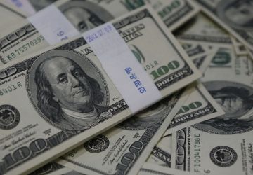 Dólar abre em queda e abaixo de R$ 6 nesta quarta após novas ameaças de Trump